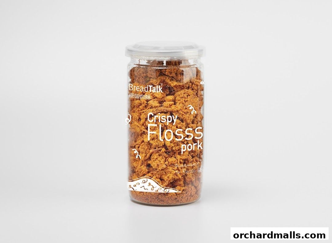 A clear jar filled with crispy pork floss from BreadTalk.
