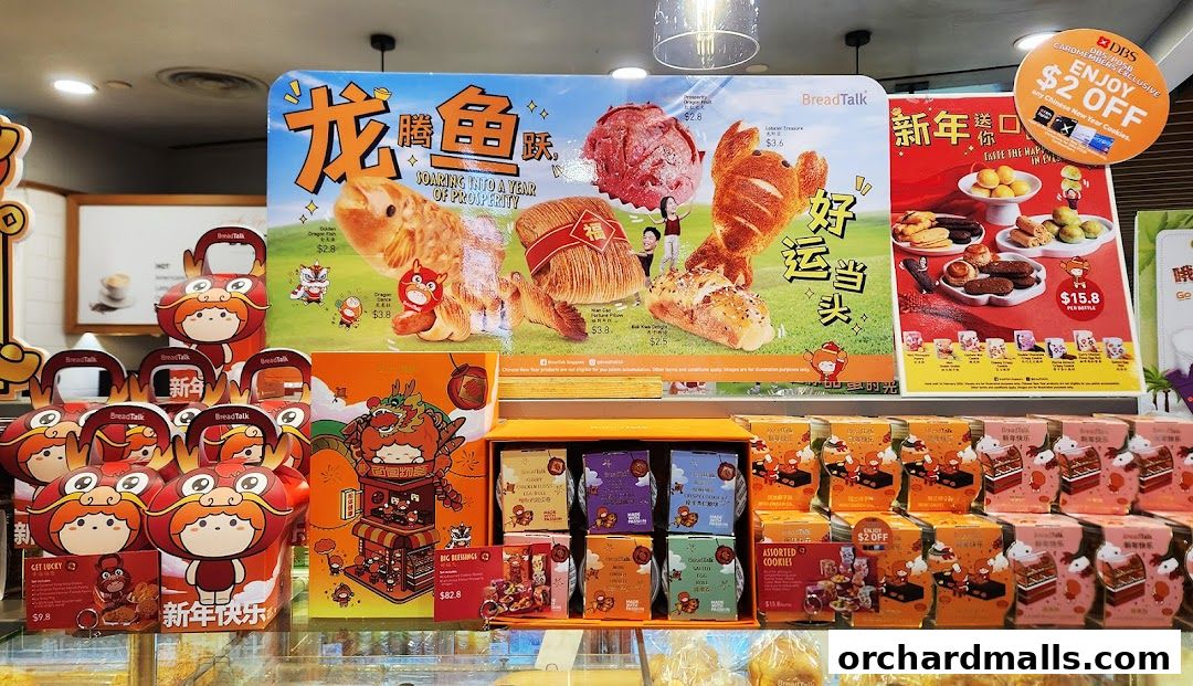BreadTalk shop display featuring festive Chinese New Year themed bread and cookies.