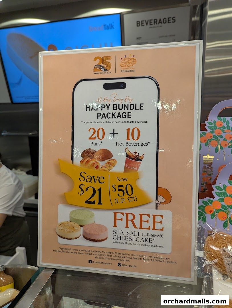 A promotional sign for BreadTalk's Happy Bundle Package offering buns and hot beverages.