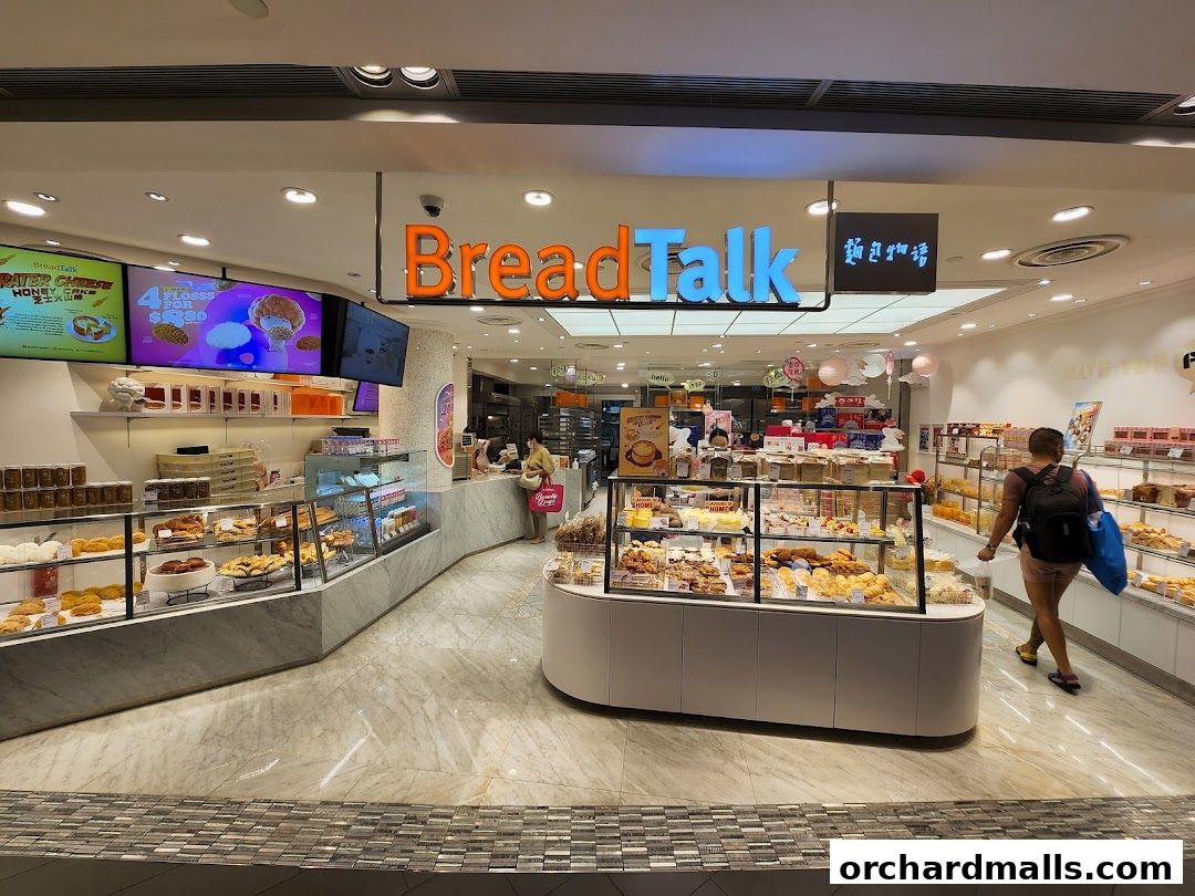 Interior view of a BreadTalk bakery showcasing a wide variety of fresh bread and pastries.