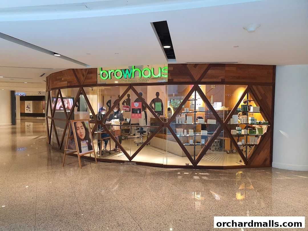 Browhaus The Brow Salon shop front with wooden accents and display shelves.
