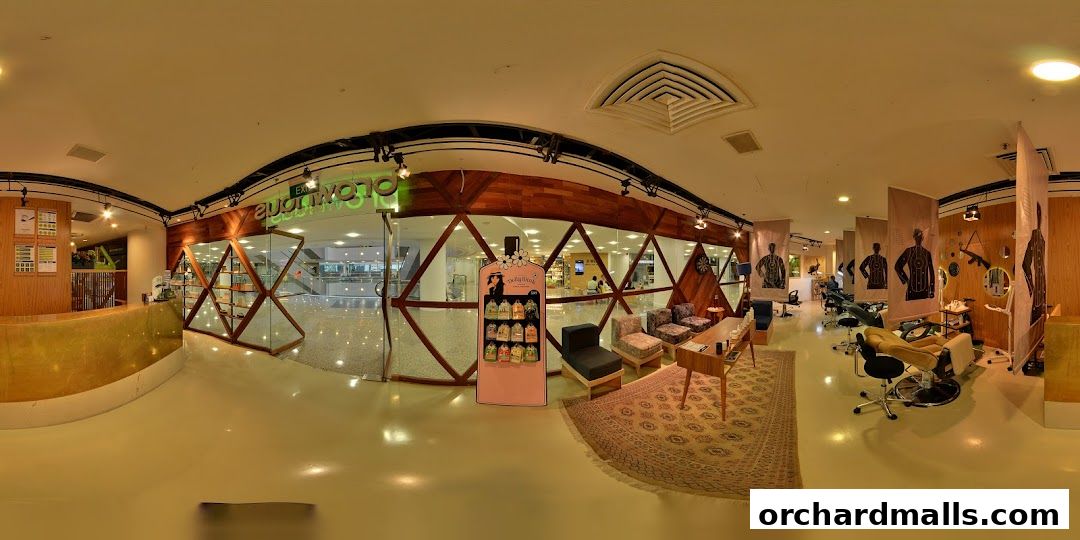 Interior view of Browhaus Wheelock, showcasing treatment chairs and retail displays.