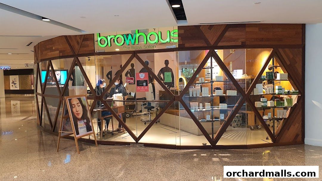 Browhaus The Brow Salon shop front with wooden accents and glass display.