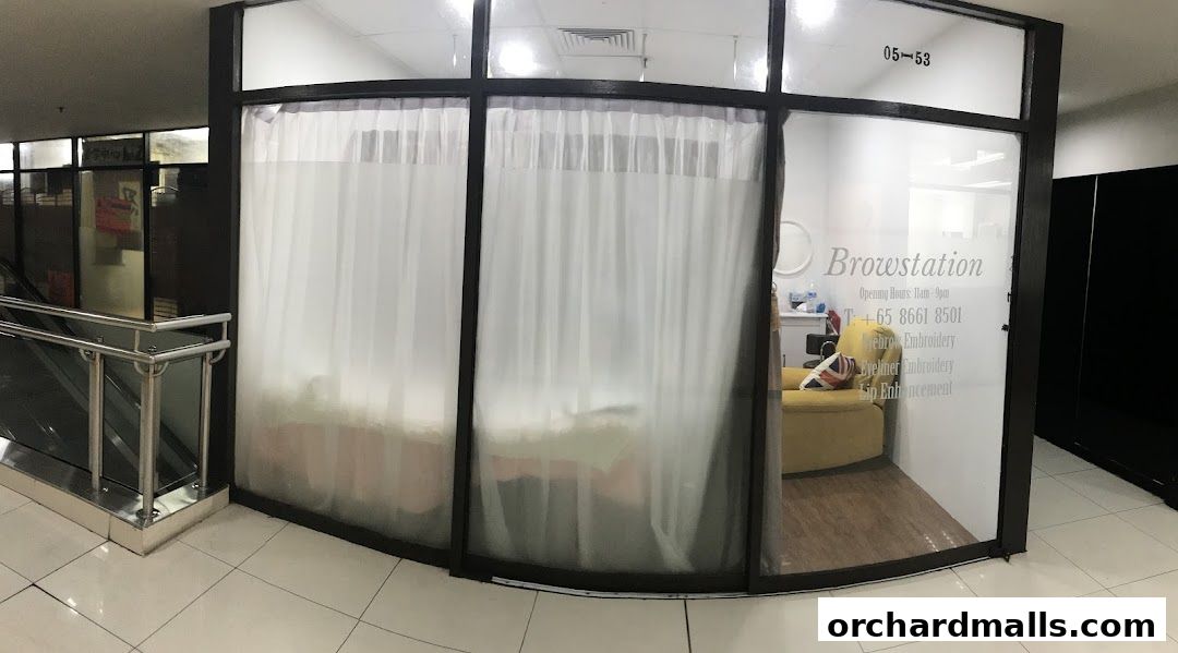 The exterior of Browstation Beaute, a beauty salon, with frosted glass windows and a glimpse of the interior.