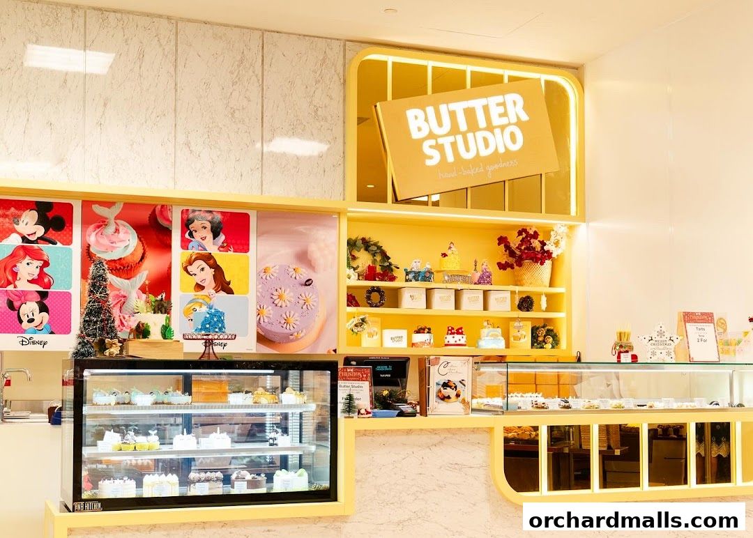 Butter Studio Takashimaya Food Hall displays cakes and pastries with Disney-themed decorations.