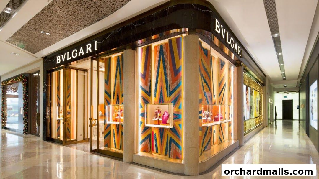 The exterior of the BVLGARI Singapore ION Orchard store, featuring a vibrant, colorful facade and illuminated display windows.