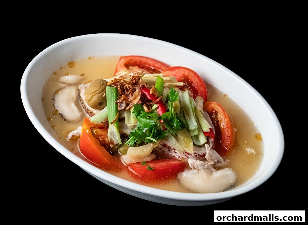 A close-up shot of a delicious seafood soup with tomatoes, herbs, and other ingredients.