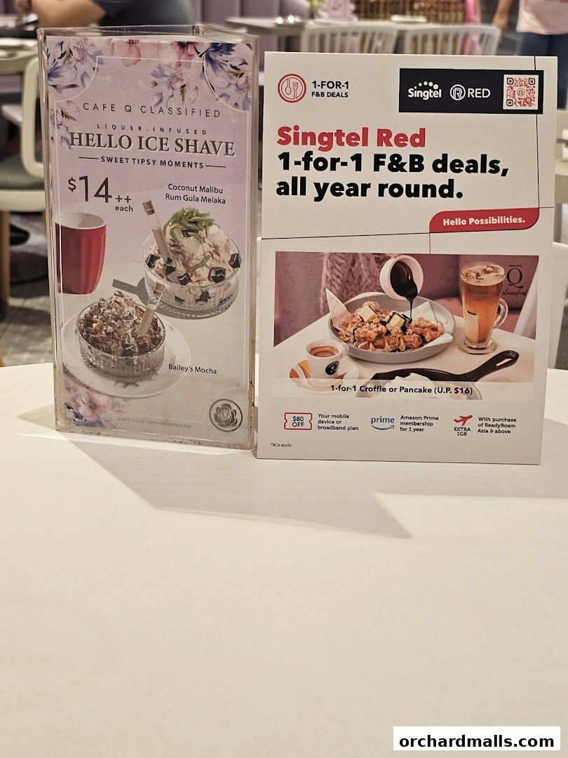 A menu display for Cafe Q Classified featuring 'Hello Ice Shave' and a Singtel Red promotion.