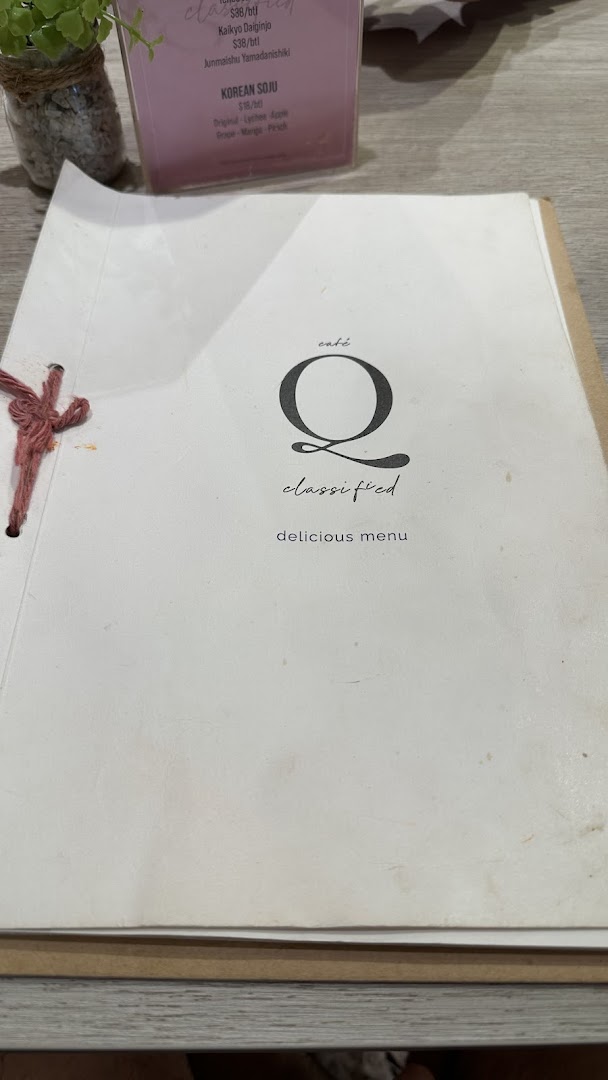 Menu page for café Q classified