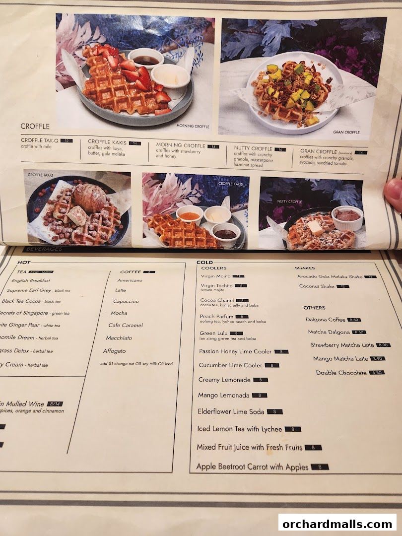 A menu featuring various croffle dishes, beverages, and other drinks with prices.