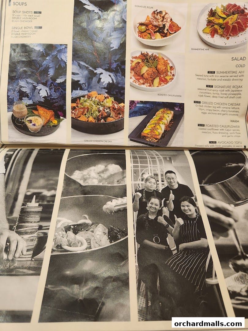 A menu page from Café Q Classified featuring soups, salads, and other dishes with accompanying images.