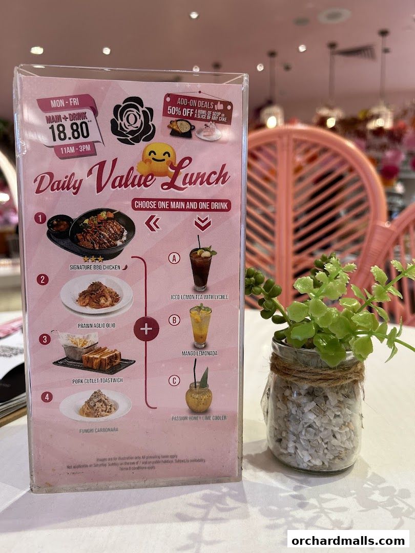 A menu for a daily value lunch at Cafe Q Classified, featuring main dishes and drinks.