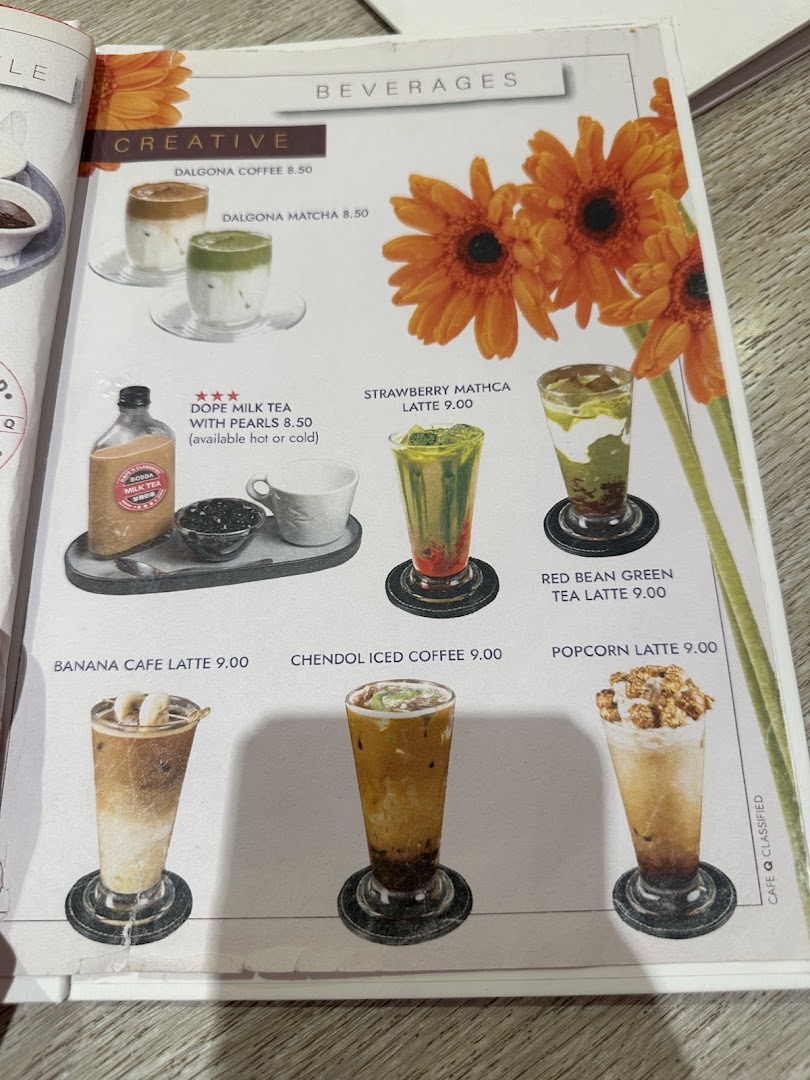 Menu page for café Q classified