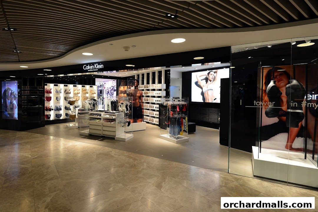 Interior view of a Calvin Klein Underwear store showcasing bras, apparel, and advertising.
