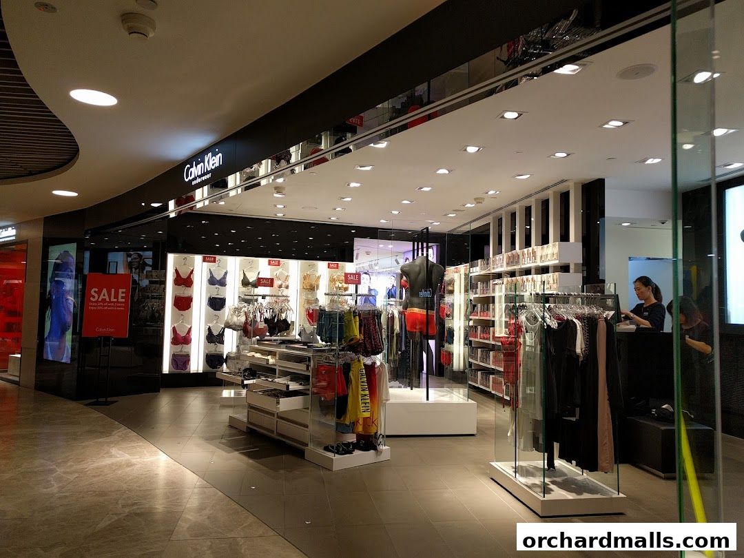 Interior view of a Calvin Klein Underwear store showcasing sale items and merchandise.