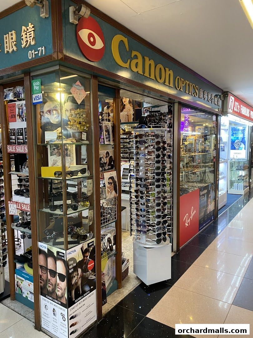 Canon Optics shop front displaying various sunglasses and optical products.