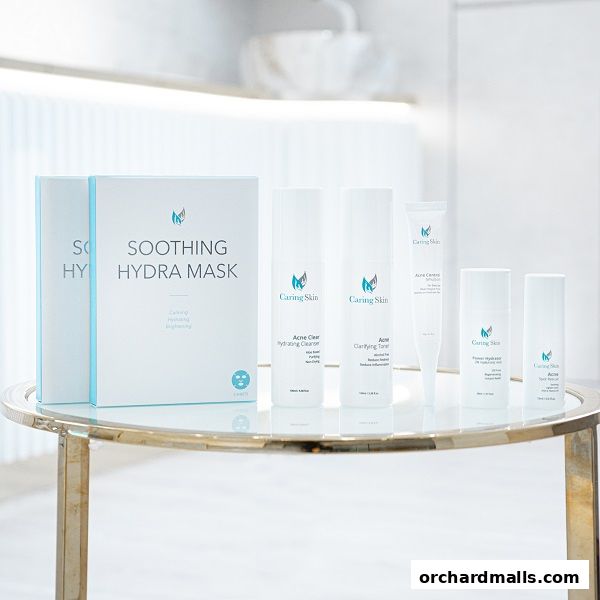 A collection of Caring Skin skincare products, including masks, cleansers, toners, and spot treatments.