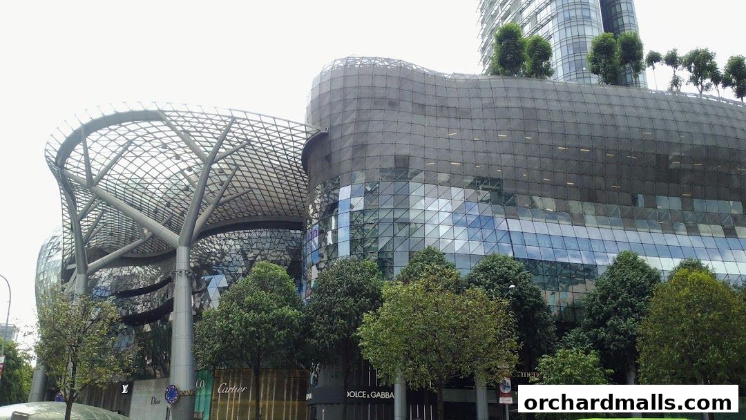 Exterior view of the ION Orchard shopping mall with the Cartier store visible.