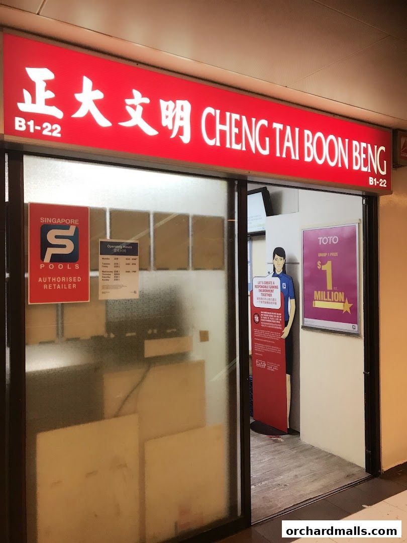 Exterior of Cheng Tai Boon Beng Singapore Pools Authorised Retailer shop with signage and posters.