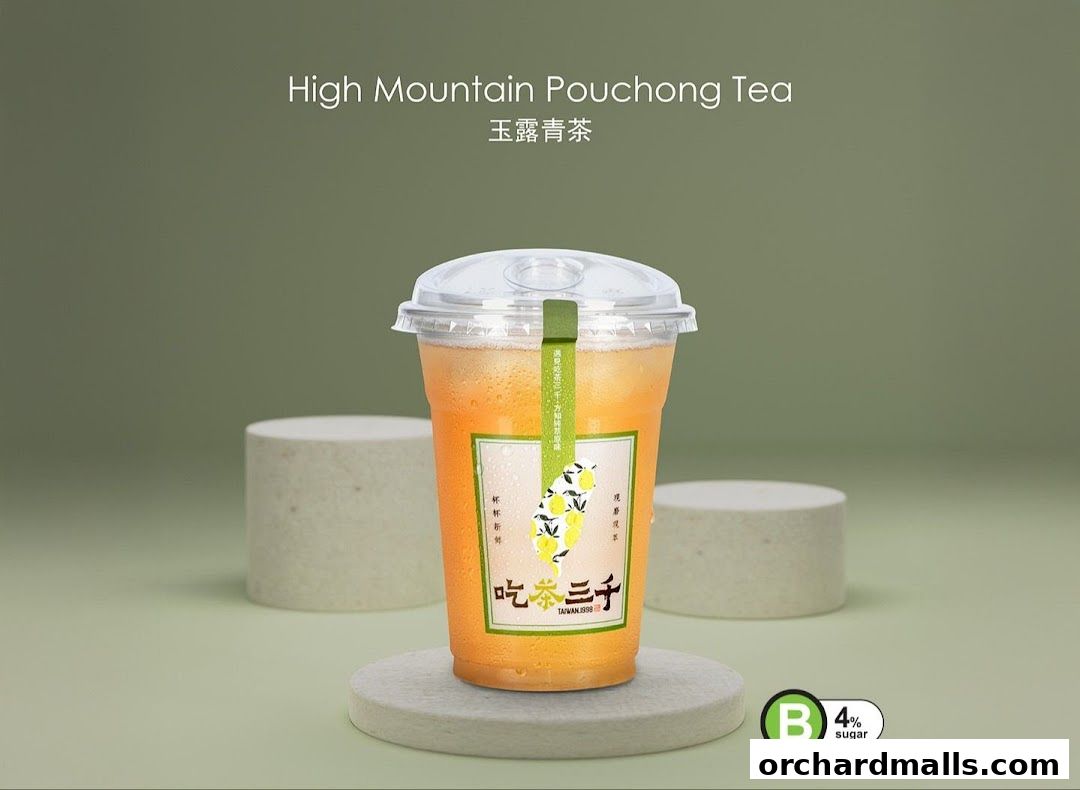 A refreshing cup of High Mountain Pouchong Tea with lemon slices and a sugar indicator.