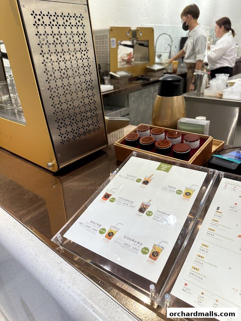 A menu displaying various fruit teas and other beverages with prices.