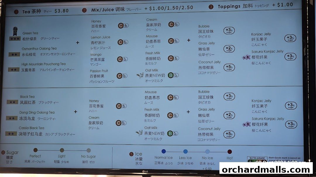 A menu board displaying tea types, mix-ins, toppings, sugar, and ice options.