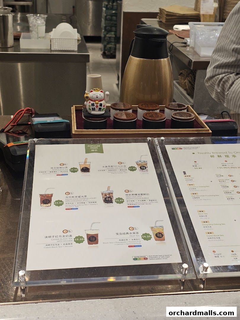 A menu display for CHICHA San Chen featuring popular bubble tea drinks and fruit teas.