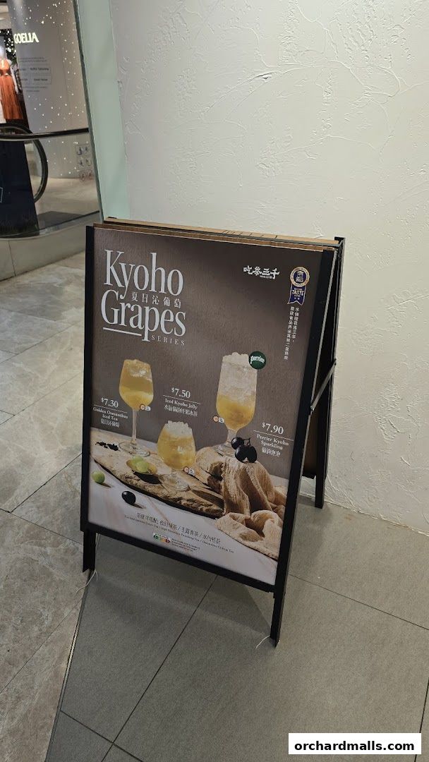 A-frame sign advertising CHICHA San Chen's Kyoho Grapes Series drinks.