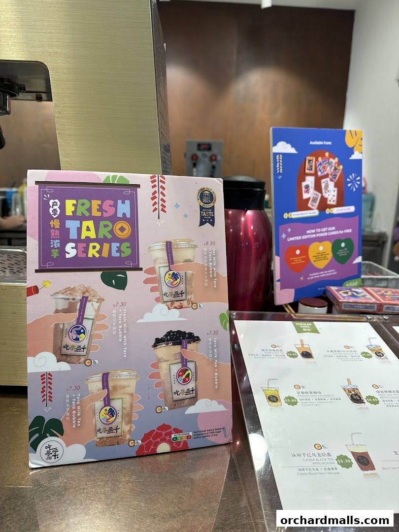 A menu display for CHICHA San Chen's Fresh Taro Series and other popular drinks.