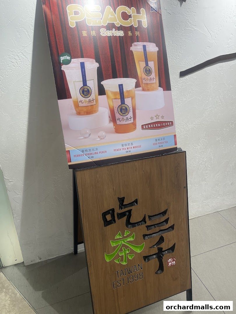 A-frame sign advertising CHICHA San Chen's Peach Series drinks.