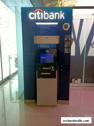 A Citibank ATM machine is shown in a modern retail environment.