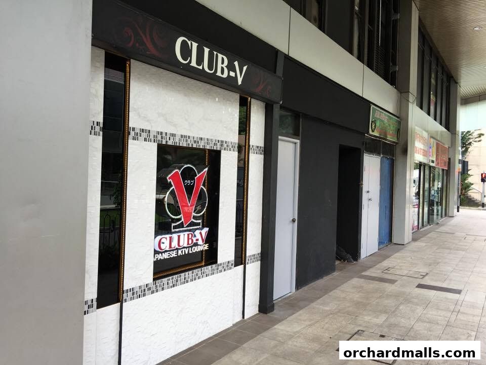 Exterior of CLUB-V Japanese KTV Lounge with a prominent sign.
