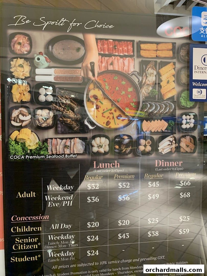 A menu board for COCA Premium Seafood Buffet showcasing lunch and dinner prices.