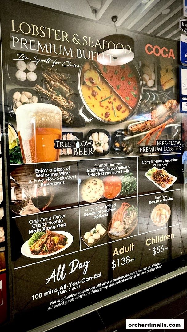 A poster advertising a Lobster & Seafood Premium Buffet with free-flow beer and lobster.