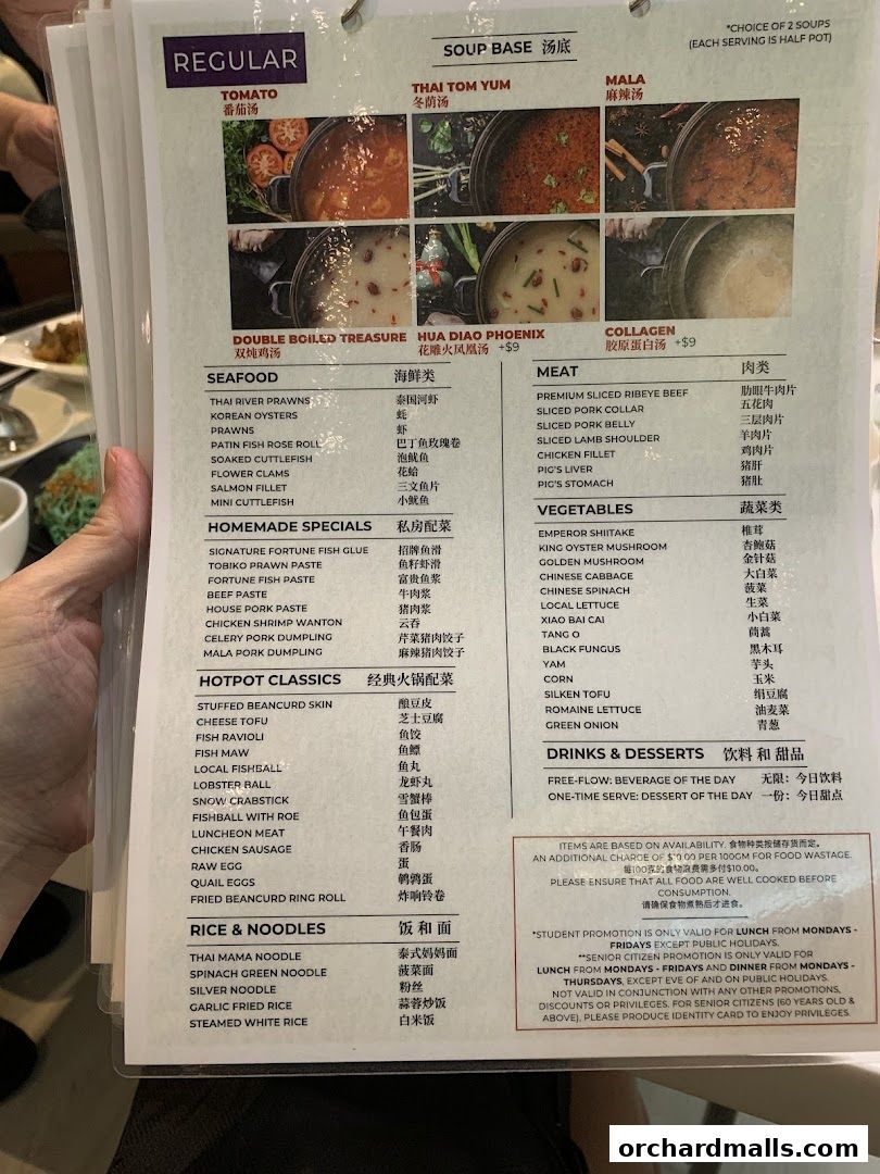 A menu for a hot pot restaurant with various soup bases, seafood, meat, vegetables, and noodles.