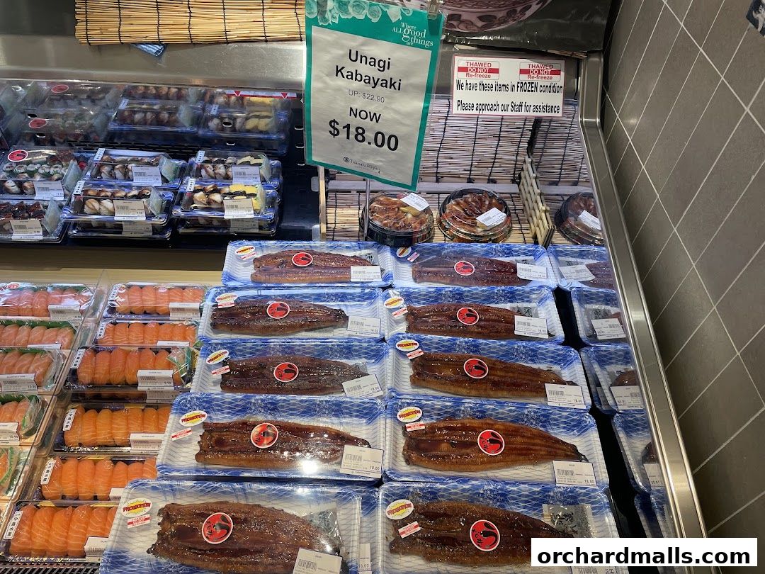 A display of pre-packaged Unagi Kabayaki and sushi at Cold Storage Takashimaya.