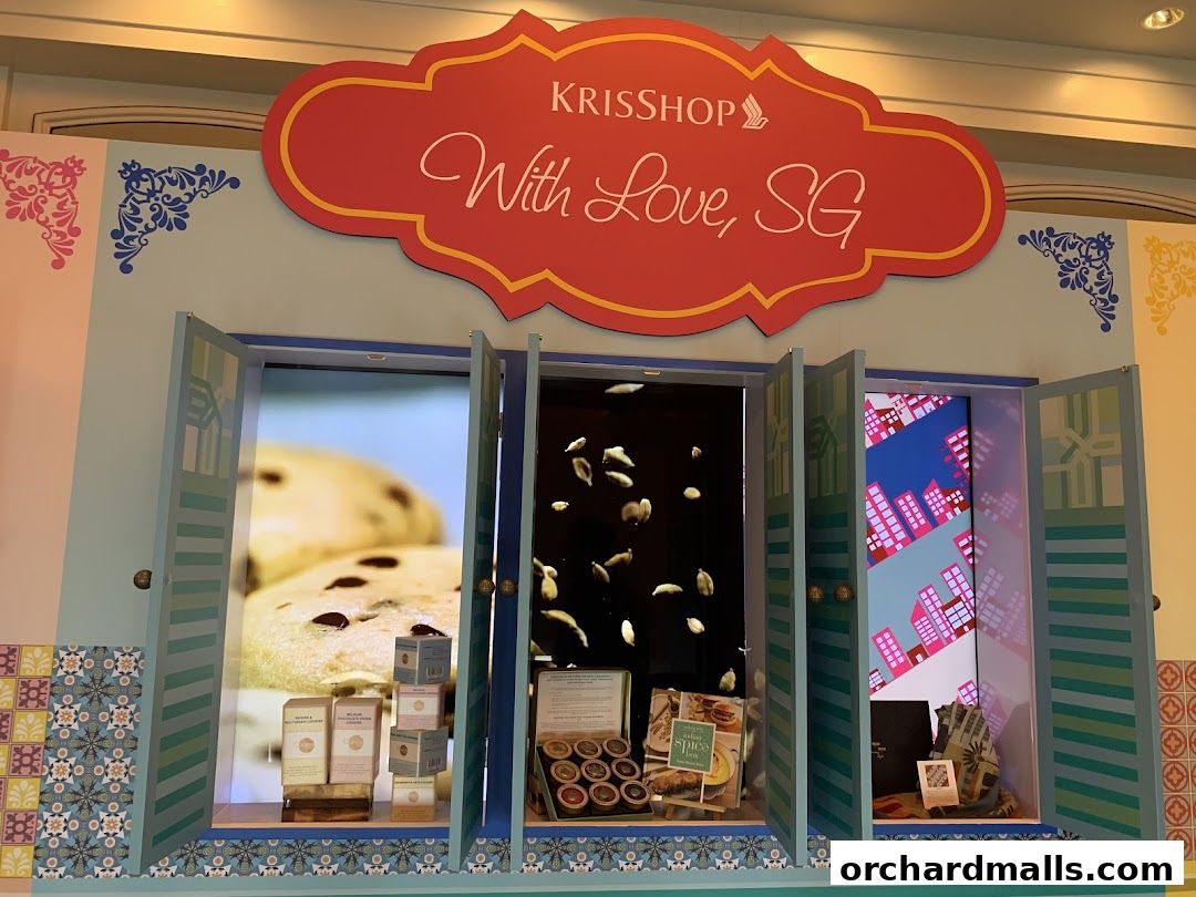 A shop display featuring cookies, spices, and city-themed artwork.