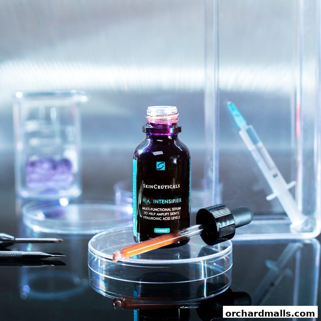 A bottle of Skinceuticals H.A. Intensifier serum with a dropper on a petri dish.