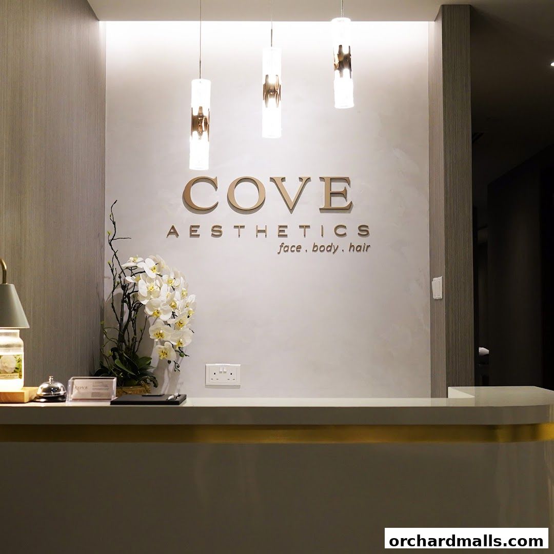 The reception area of Cove Aesthetics Medispa with the brand name displayed.