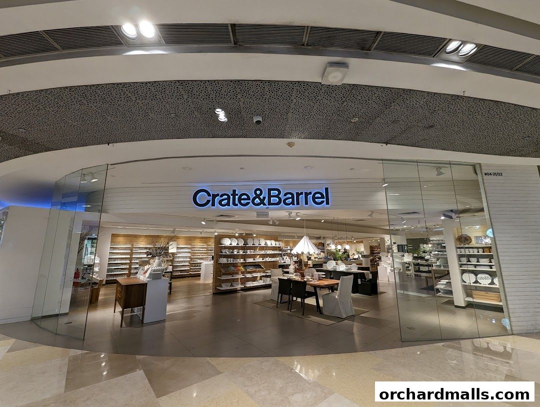 The entrance to a Crate and Barrel store, showcasing home furnishings and decor.