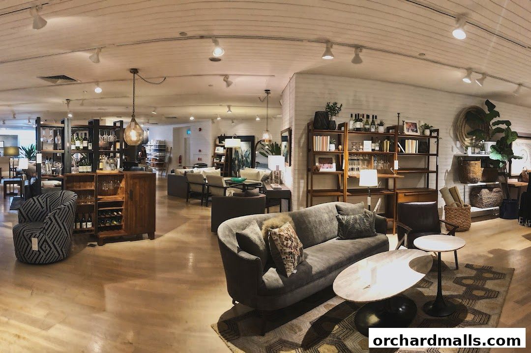 Interior view of a Crate and Barrel store showcasing living room furniture and decor.