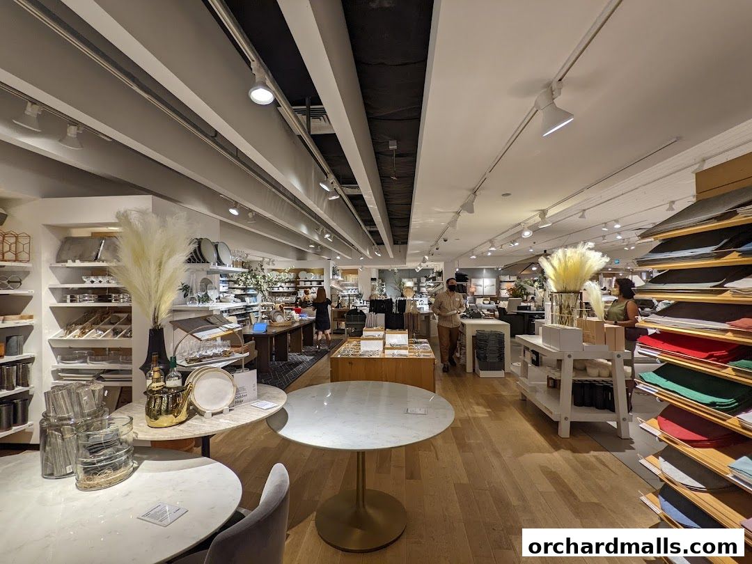 Interior view of a Crate and Barrel store showcasing home decor and kitchenware.