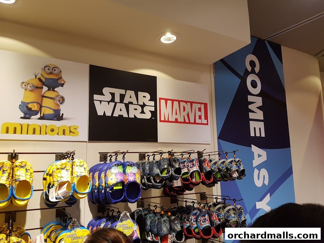 Crocs store interior displaying Minions, Star Wars, and Marvel themed footwear.
