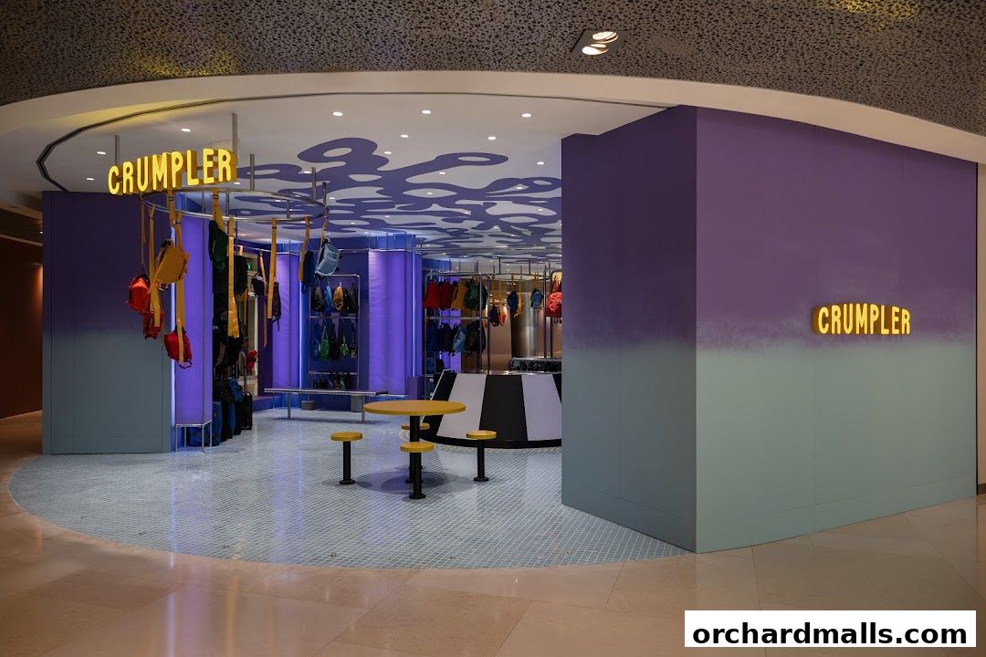 The Crumpler shop interior, showcasing colorful bags and a modern, vibrant design.