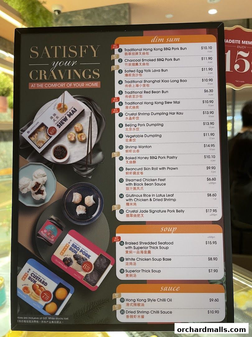 A menu board for Crystal Jade Hong Kong Kitchen featuring dim sum, soup, and sauce items.