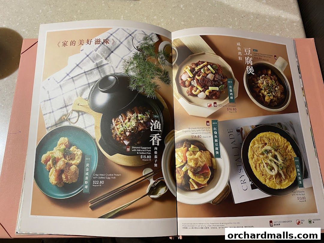 A menu from Crystal Jade Hong Kong Kitchen showcasing various delicious Chinese dishes.