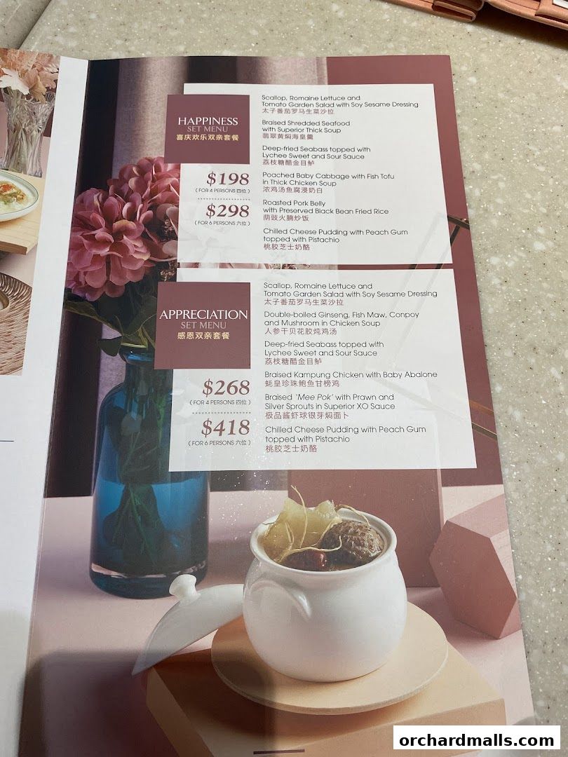 A menu from Crystal Jade Hong Kong Kitchen featuring set menus with prices and dish descriptions.