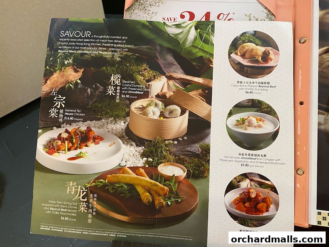 A menu showcasing plant-based meat-free dishes from Crystal Jade Hong Kong Kitchen.