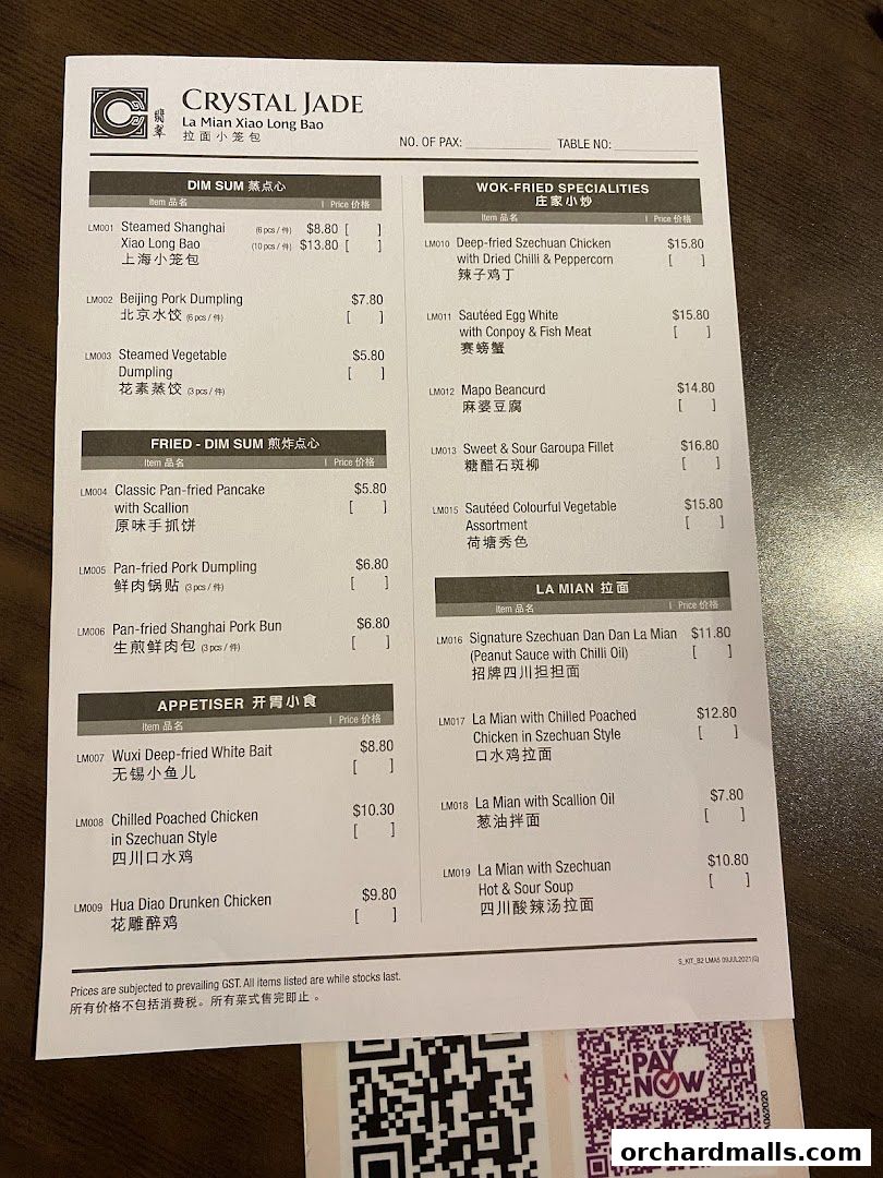 A menu from Crystal Jade Hong Kong Kitchen featuring Dim Sum, Wok-Fried Specialities, and La Mian.