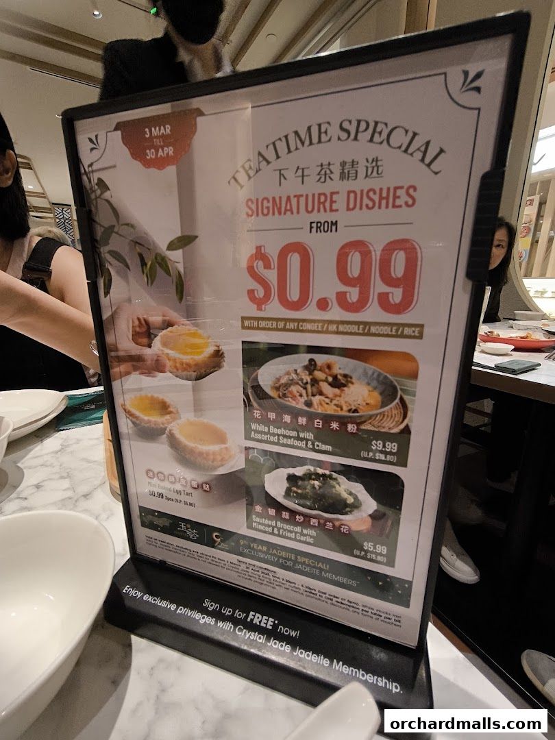 A menu board advertising Teatime Special Signature Dishes from $0.99 at Crystal Jade.